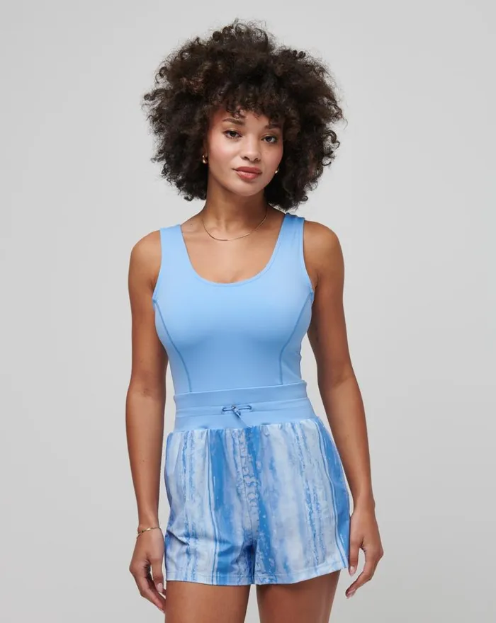 TravisMathew DAWN GLOW TECH WOVEN ROMPER Cornflower Blue Multi Women Jumpsuits and Rompers TravisMathew DAWN GLOW TECH WOVEN ROMPER Cornflower Blue Multi Women Jumpsuits and Rompers