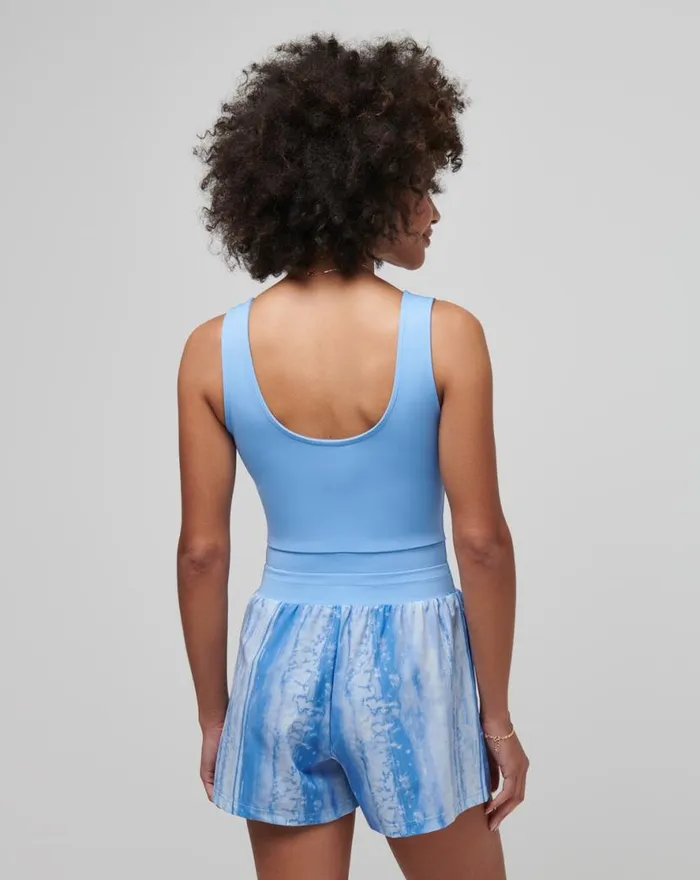 TravisMathew DAWN GLOW TECH WOVEN ROMPER Cornflower Blue Multi Women Jumpsuits and Rompers TravisMathew DAWN GLOW TECH WOVEN ROMPER Cornflower Blue Multi Women Jumpsuits and Rompers