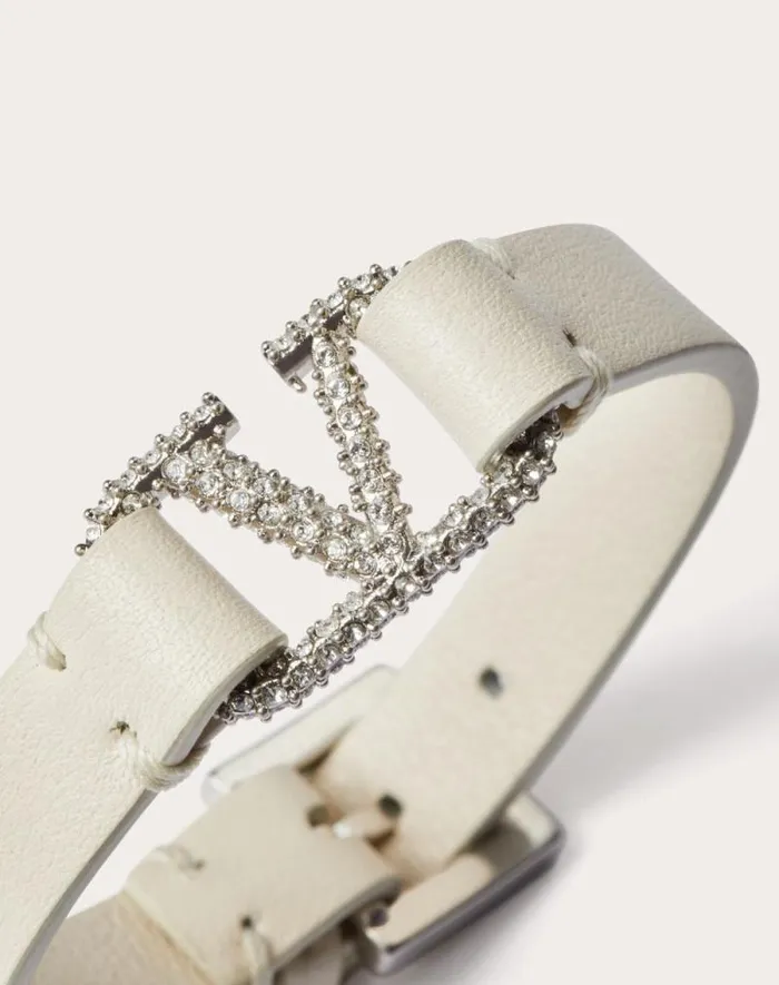 Valentino Jewelry Woman Valentino Garavani Vlogo Signature Leather And Crystal Bracelet For Woman In Light Ivory Light Ivory Valentino Jewelry Woman Valentino Garavani Vlogo Signature Leather And Crystal Bracelet For Woman In Light Ivory Light Ivory