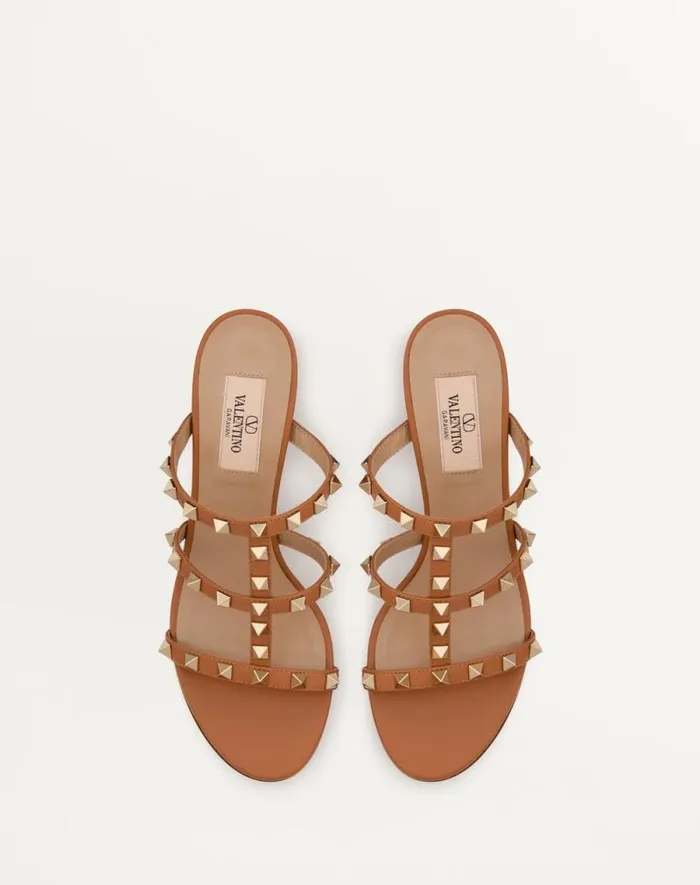 Valentino Sandals Woman Rockstud Calfskin Leather Slide Sandal 60 Mm For Woman In Almond Almond Valentino Sandals Woman Rockstud Calfskin Leather Slide Sandal 60 Mm For Woman In Almond Almond