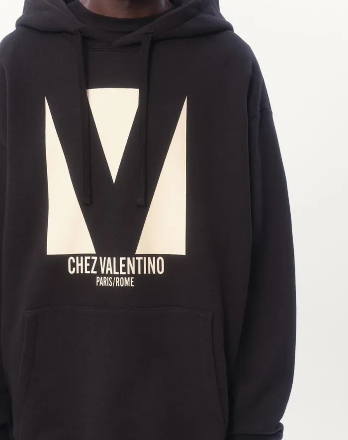 Valentino Tshirts And Sweatshirts Man Cotton Hooded Sweatshirt With Chez Valentino Print For Man In Black Black Valentino Tshirts And Sweatshirts Man Cotton Hooded Sweatshirt With Chez Valentino Print For Man In Black Black