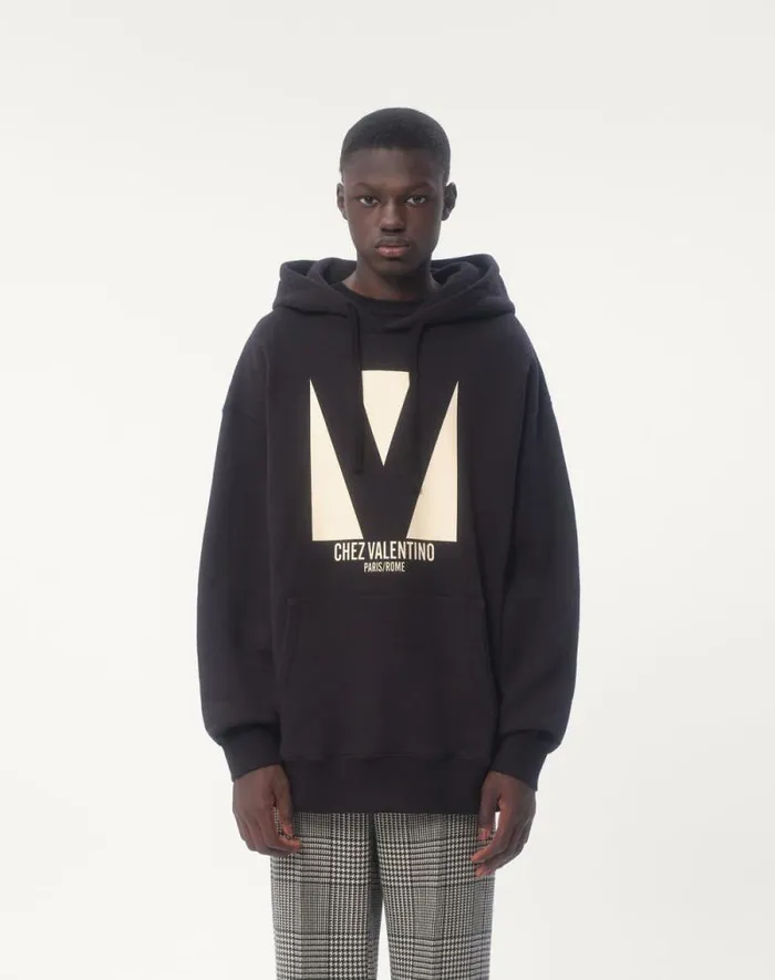 Valentino Tshirts And Sweatshirts Man Cotton Hooded Sweatshirt With Chez Valentino Print For Man In Black Black Valentino Tshirts And Sweatshirts Man Cotton Hooded Sweatshirt With Chez Valentino Print For Man In Black Black