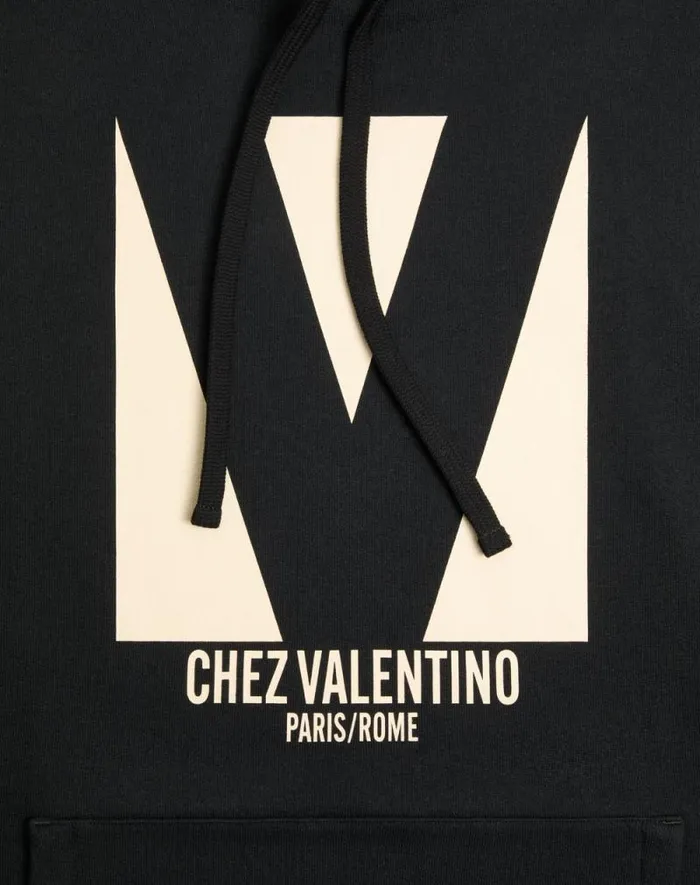 Valentino Tshirts And Sweatshirts Man Cotton Hooded Sweatshirt With Chez Valentino Print For Man In Black Black Valentino Tshirts And Sweatshirts Man Cotton Hooded Sweatshirt With Chez Valentino Print For Man In Black Black