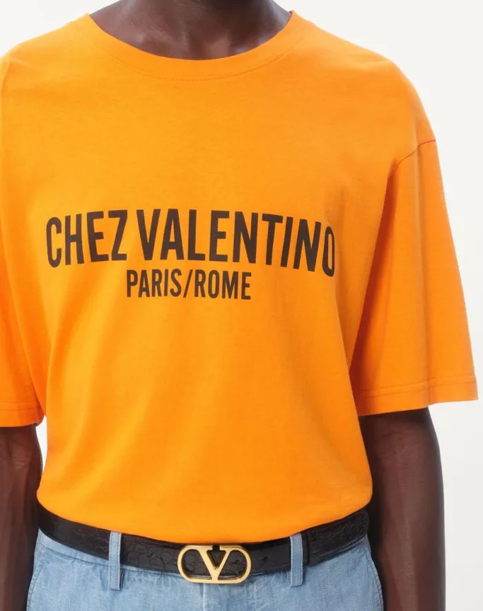 Valentino Tshirts And Sweatshirts Man Cotton Tshirt With Chez Valentino Print For Man In Orange Orange Valentino Tshirts And Sweatshirts Man Cotton Tshirt With Chez Valentino Print For Man In Orange Orange