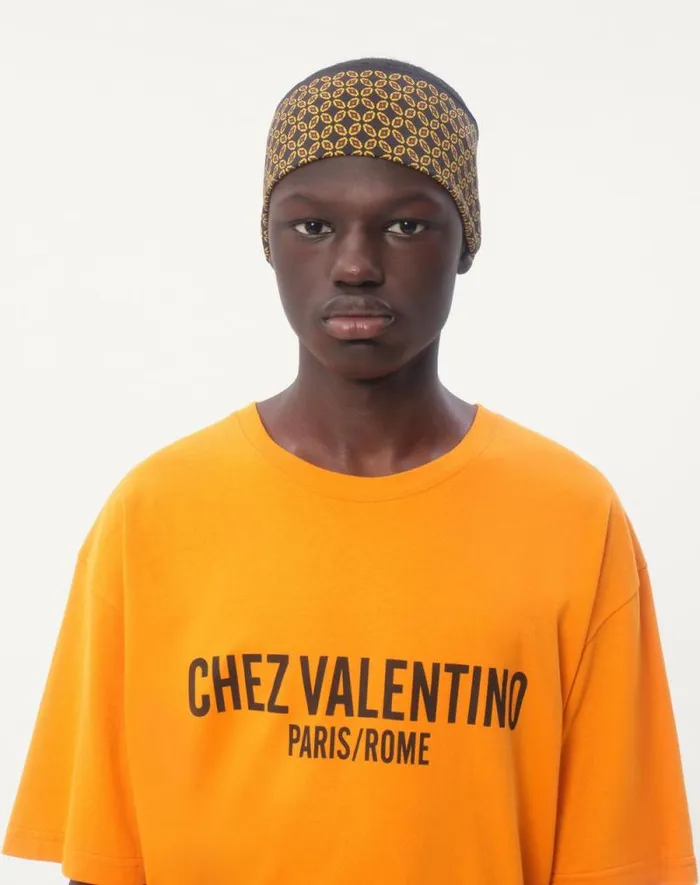 Valentino Tshirts And Sweatshirts Man Cotton Tshirt With Chez Valentino Print For Man In Orange Orange Valentino Tshirts And Sweatshirts Man Cotton Tshirt With Chez Valentino Print For Man In Orange Orange