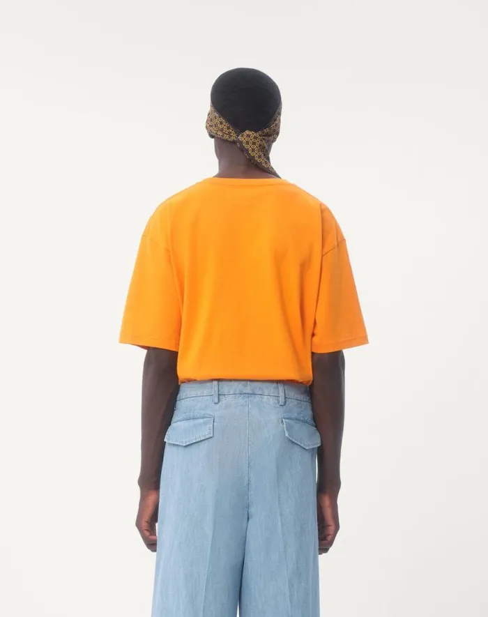 Valentino Tshirts And Sweatshirts Man Cotton Tshirt With Chez Valentino Print For Man In Orange Orange Valentino Tshirts And Sweatshirts Man Cotton Tshirt With Chez Valentino Print For Man In Orange Orange