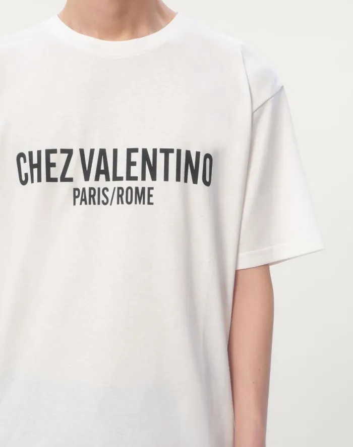 Valentino Tshirts And Sweatshirts Man Cotton Tshirt With Chez Valentino Print For Man In Orange Orange Valentino Tshirts And Sweatshirts Man Cotton Tshirt With Chez Valentino Print For Man In Orange Orange